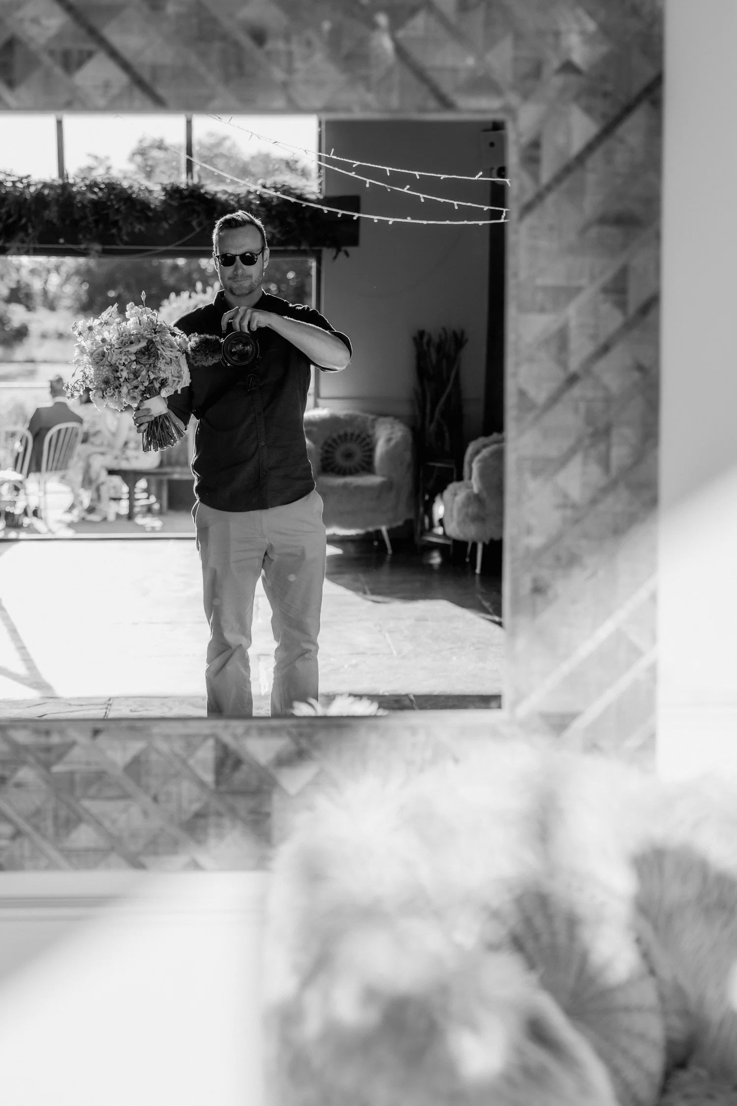 Ben Holbrook, wedding photographer, photographed outdoors in south Wales